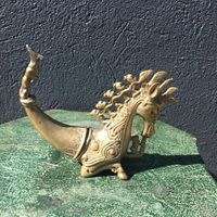 Oriental gunpowder holder