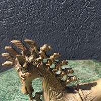 Oriental gunpowder holder
