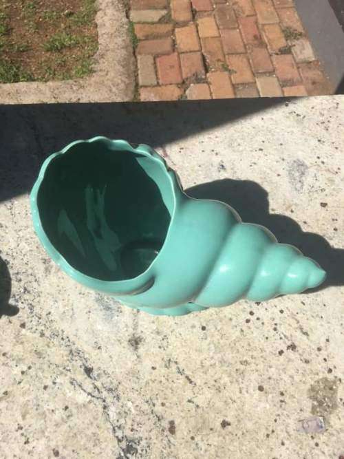 Lucia ware shell flower vase in mint condition.