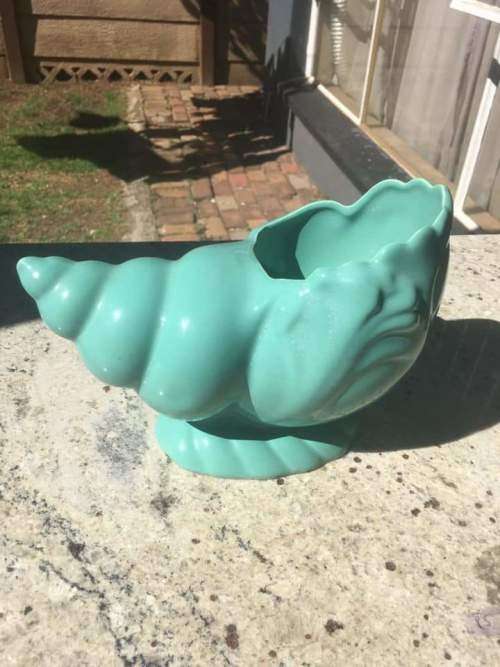 Lucia ware shell flower vase in mint condition.