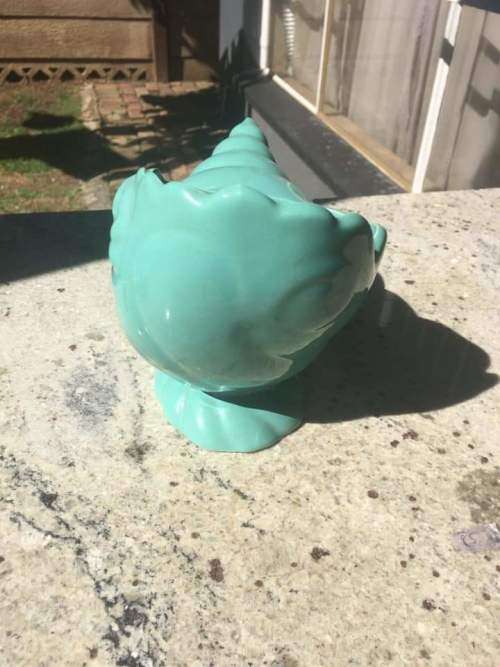Lucia ware shell flower vase in mint condition.