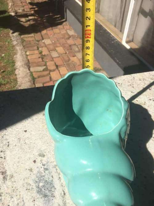 Lucia ware shell flower vase in mint condition.