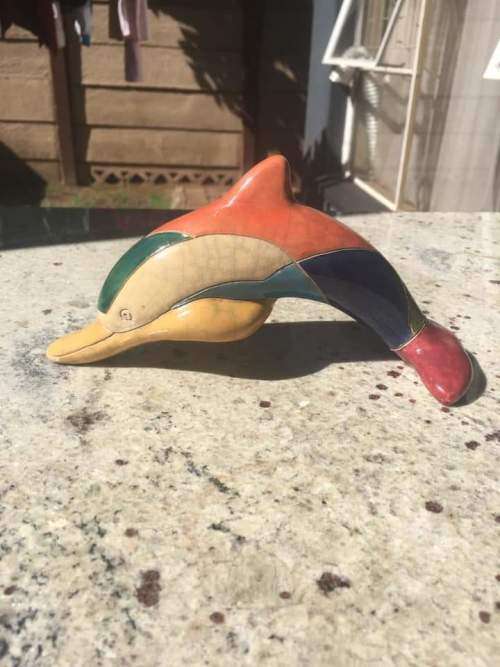 The Fenix Ranku pottery dolphin in mint condition.