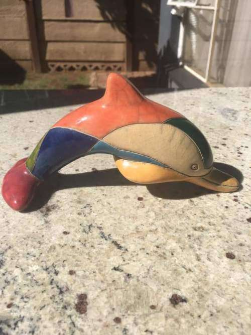 The Fenix Ranku pottery dolphin in mint condition.
