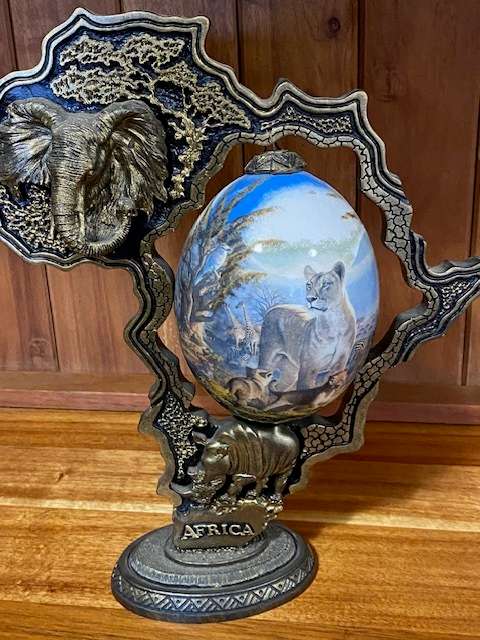 DECORATIVE AFRICAN CONTINENT STAND WITH OSTRICH EGG