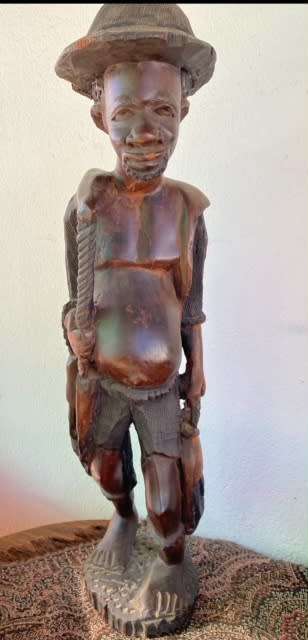 SOLID.WOOD MALAWIAN FISHER MAN SCULPTURE