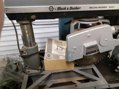 3KW 220V DEWALT BLACK & DECKER RADIAL ARM SAW ON TABLE.