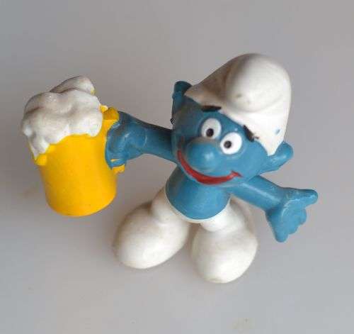 Vintage beer drinking smurf