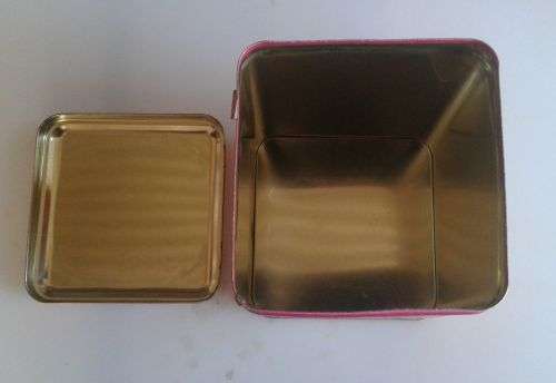 Quality street tins