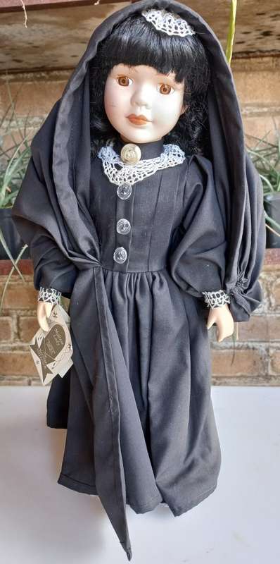 Maltese Porcelain doll