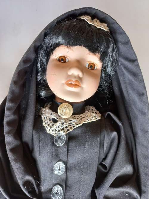 Maltese Porcelain doll