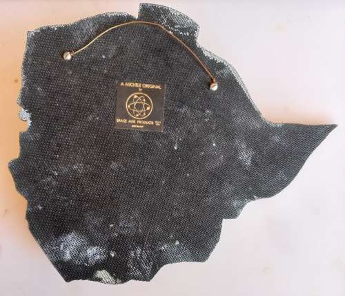 A Michele original by space age products wall plaque