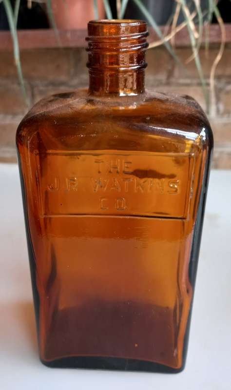 The JR Watkins Co amber glass medicine bottle