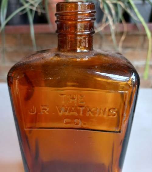 The JR Watkins Co amber glass medicine bottle