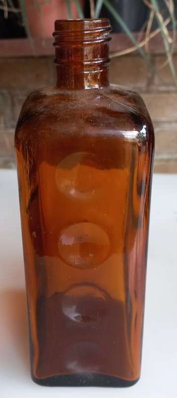 The JR Watkins Co amber glass medicine bottle