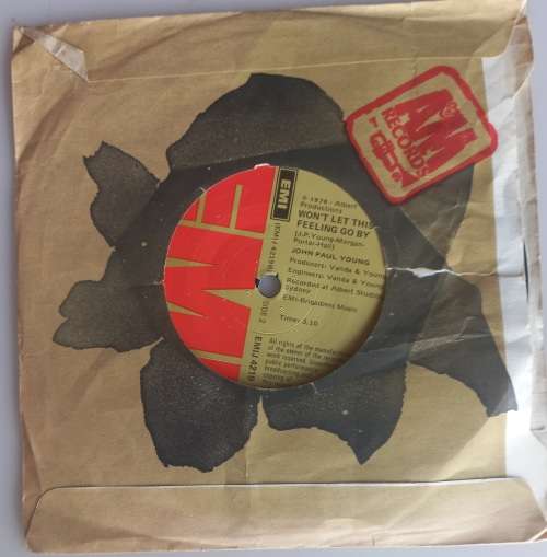 Seven single: John Paul Young - Love is in the air and Won`t let this feeling go by