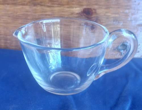 Small glass milk jug
