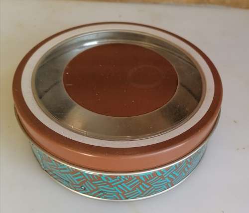 Chocolate coated assorted nuts tin