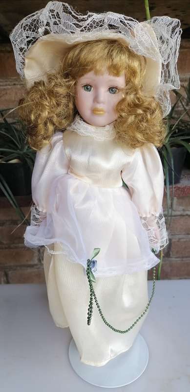 Collector`s choice genuine fine bisque porcelain doll