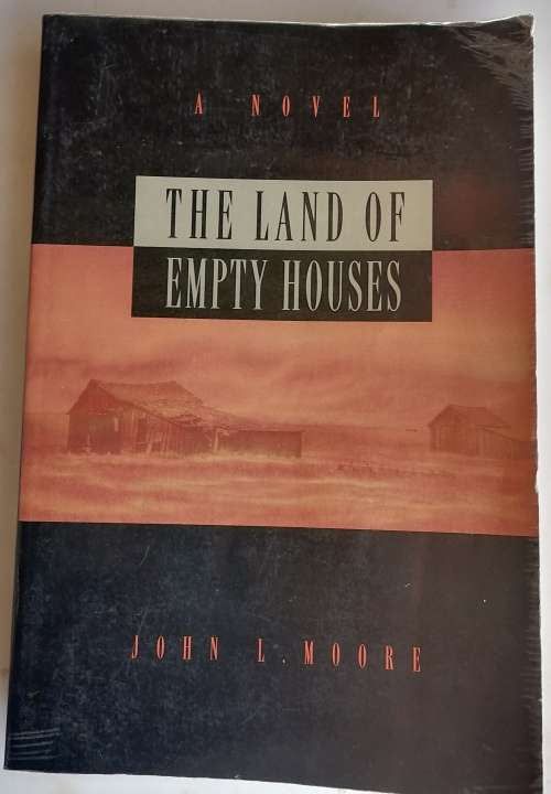 The land of empty houses by John L Moore