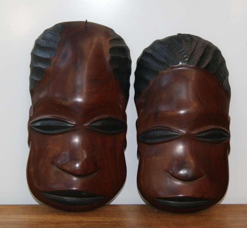 Pair of Hand Carved Male and Female Wooden Masks