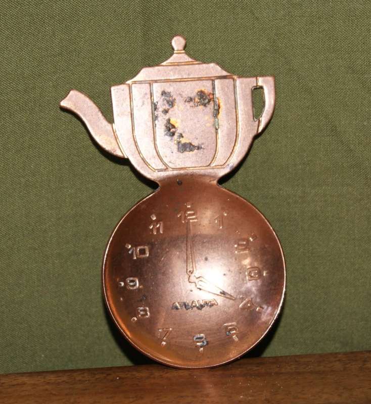 Copper Tea Measure Showing Clock