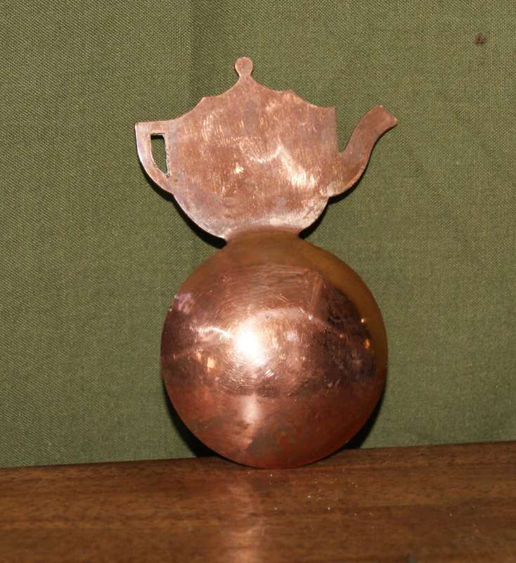 Copper Tea Measure Showing Clock