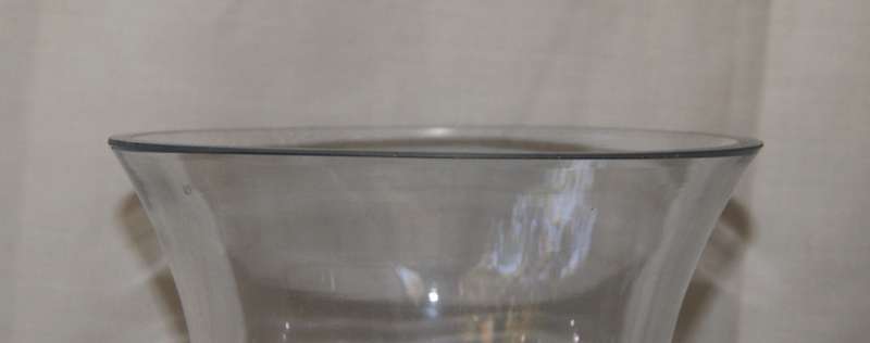Tall Footed Vase with Scroll Feet