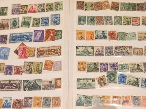 12 double pages of weird and wonderful treasure hunt stamps unvalued