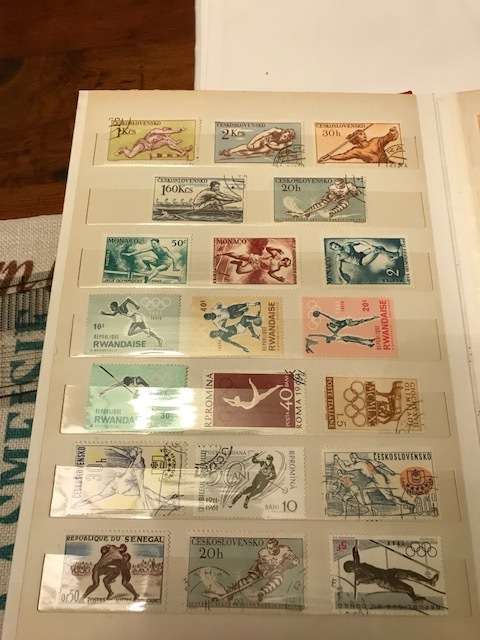 Book with collection of 286 Olympic games stamps