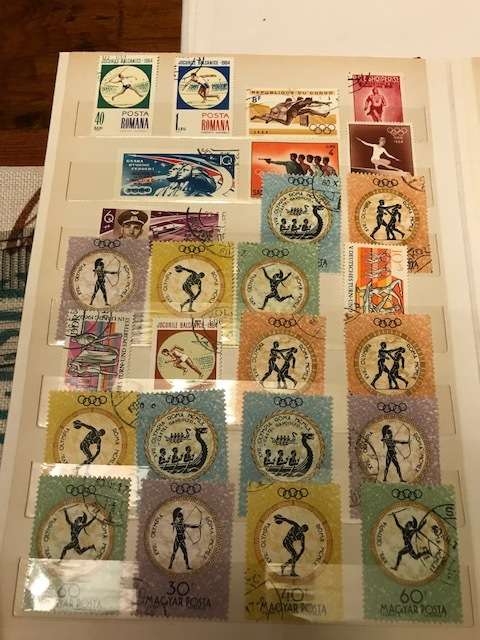 Book with collection of 286 Olympic games stamps