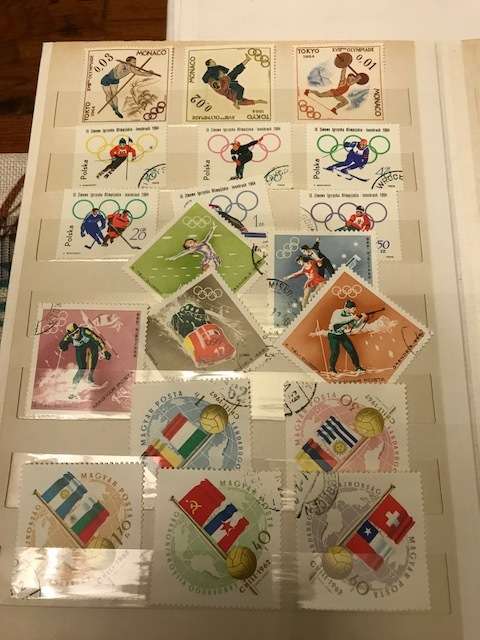 Book with collection of 286 Olympic games stamps