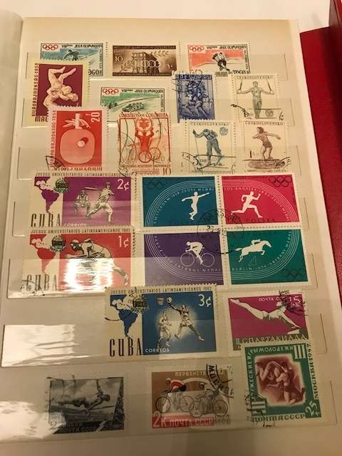 Book with collection of 286 Olympic games stamps
