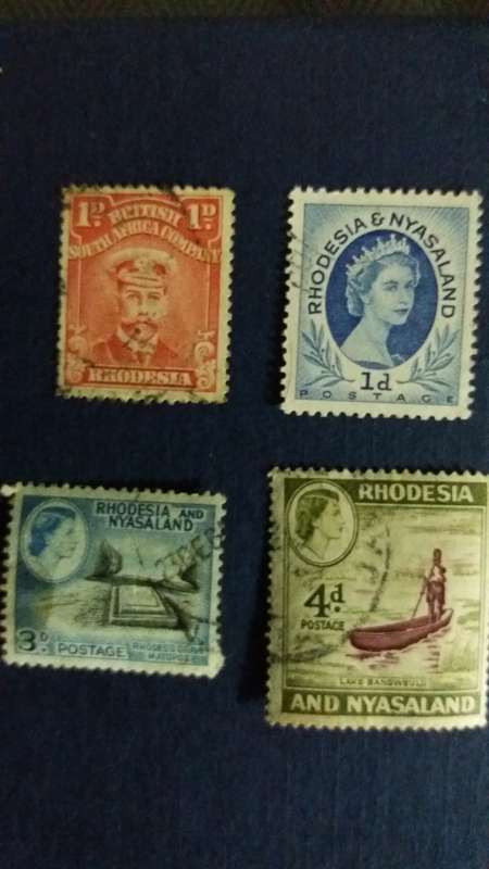 Rhodesia & Nyasaland  King George 1922 1d & Queen Elizabeth 1954 1d , 1959 3d & 4d.