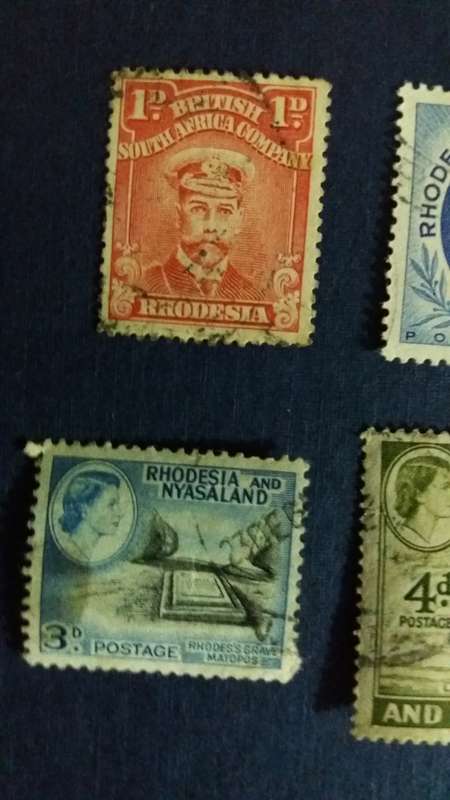 Rhodesia & Nyasaland  King George 1922 1d & Queen Elizabeth 1954 1d , 1959 3d & 4d.