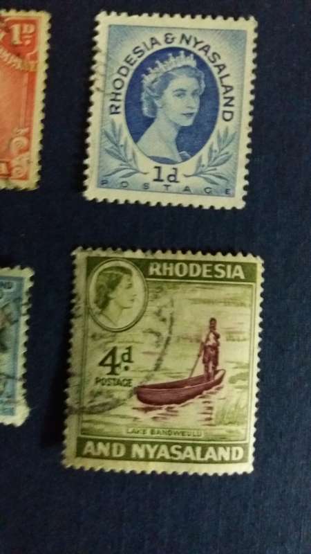 Rhodesia & Nyasaland  King George 1922 1d & Queen Elizabeth 1954 1d , 1959 3d & 4d.