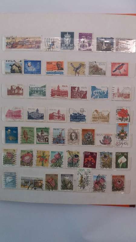 + 621 World Stamps from 1960s including RSA in Vintage Flying Eagle Album 16 Pages * 32x26x2*
