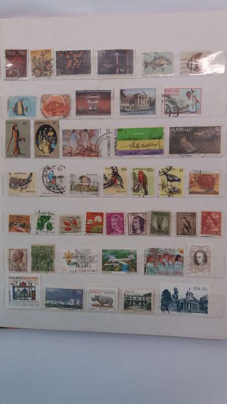 + 621 World Stamps from 1960s including RSA in Vintage Flying Eagle Album 16 Pages * 32x26x2*