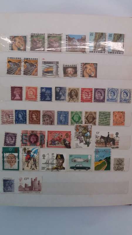 + 621 World Stamps from 1960s including RSA in Vintage Flying Eagle Album 16 Pages * 32x26x2*