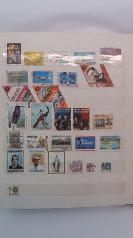+ 621 World Stamps from 1960s including RSA in Vintage Flying Eagle Album 16 Pages * 32x26x2*