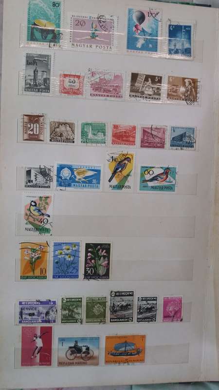 World Stamps  +- 372 stamps in Sailing Boat Album 14 pages