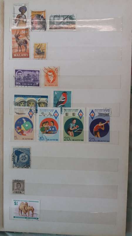 World Stamps  +- 372 stamps in Sailing Boat Album 14 pages