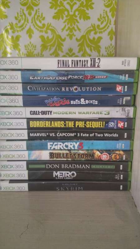 Stack of Xbox 360 games