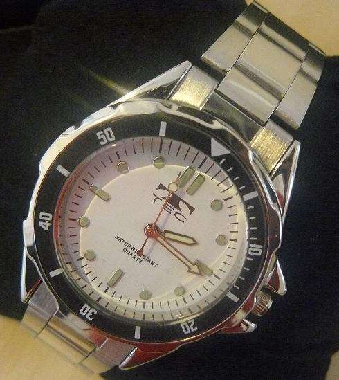 SILVER TEC MENS WATCH (water resistant, with glow in the dark dials)!