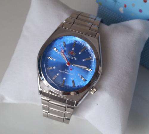 SILVER OREINTE WATCH - WATER RESISTANT