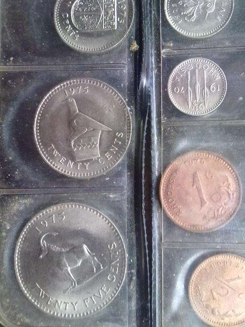 1975 Rhodesia 7 coin set in black holder, the 7th coin is a 1970 2 1/2c coin
