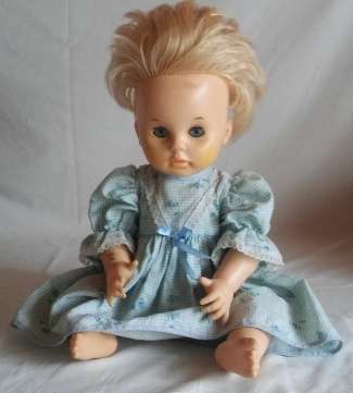Doll In Blue Dress