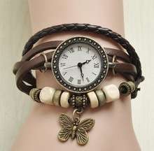 WOMENS LEATHER DRESS WATCH THIS IS A COFFEE BROWN COLOR, CHARMS MAY DIFFER