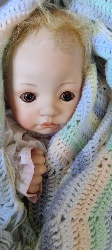 Sweet happy porcelain doll baby girl