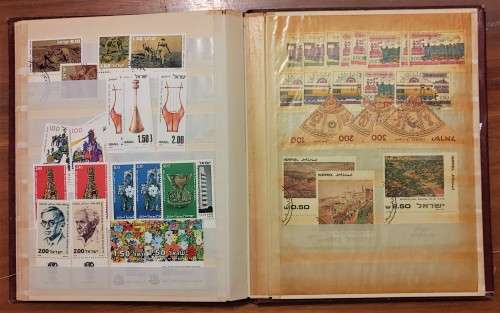 SMALL STOCKBOOK WITH MODERN ISRAELI STAMPS MINT AND USED